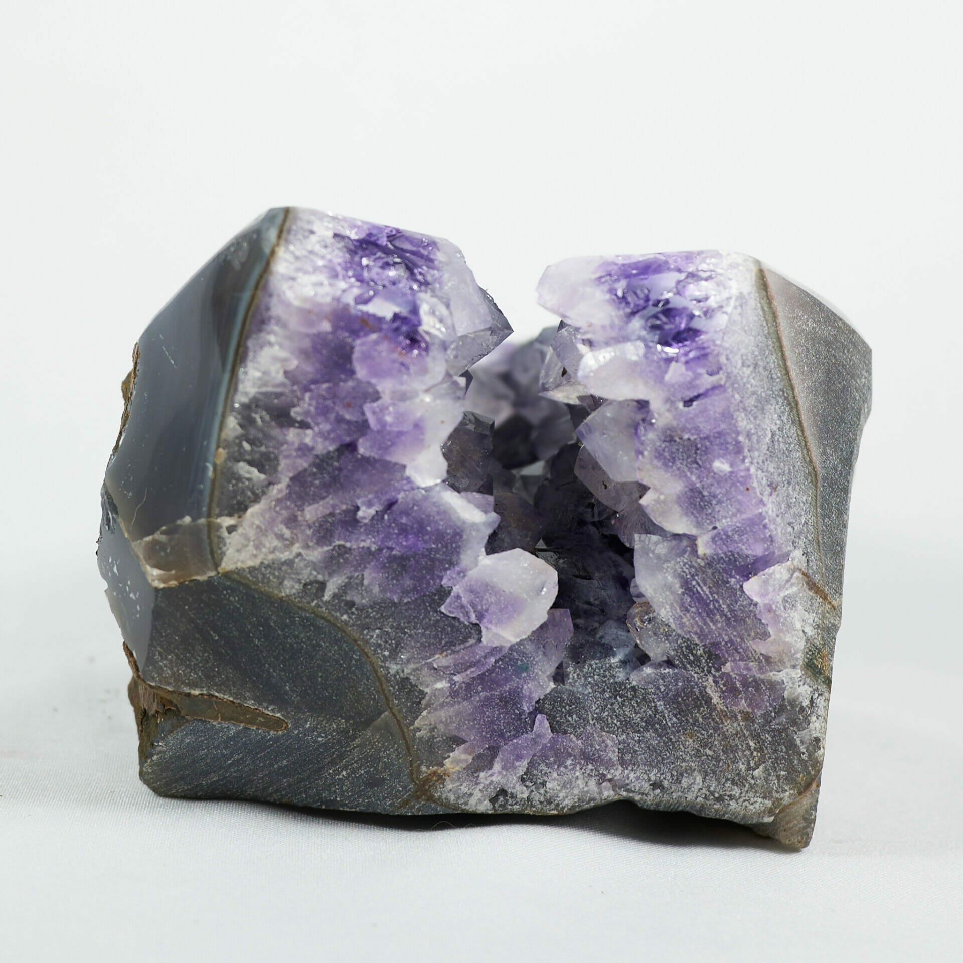 Gorgeous amethyst geode base cluster with high contrast color bottom