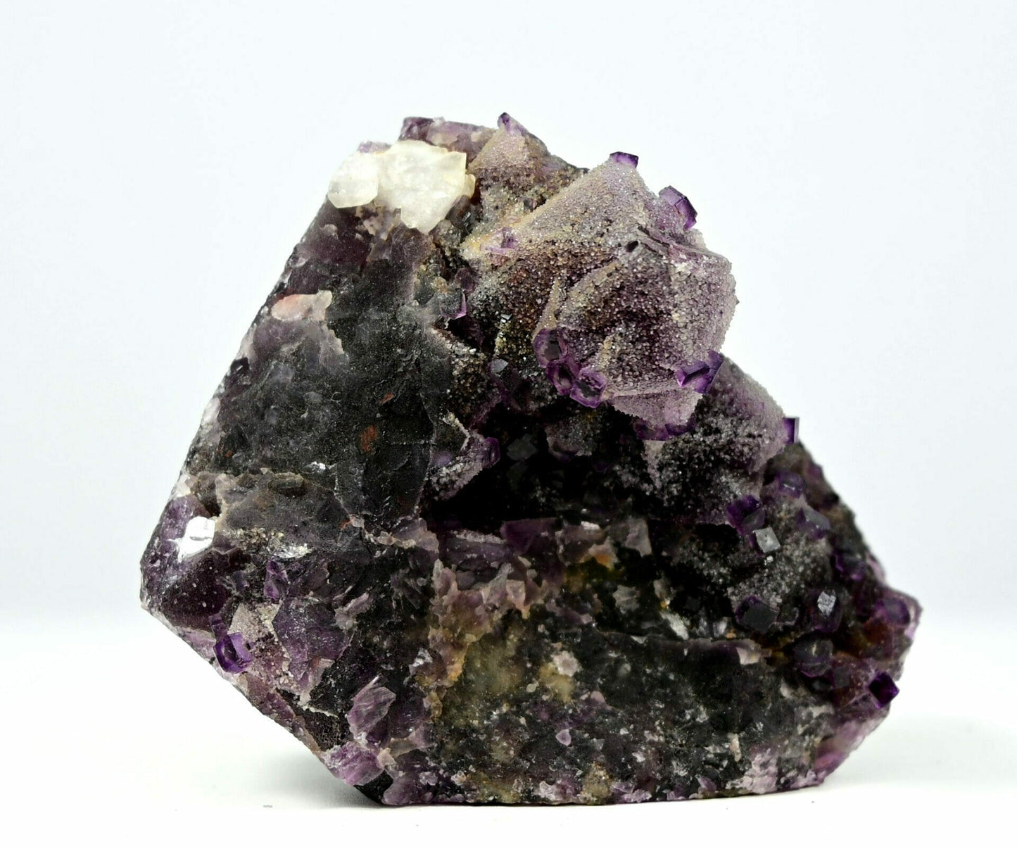 Unusual complete purple fluorite with multiple generation sugar drazy covered and some calcite side 1