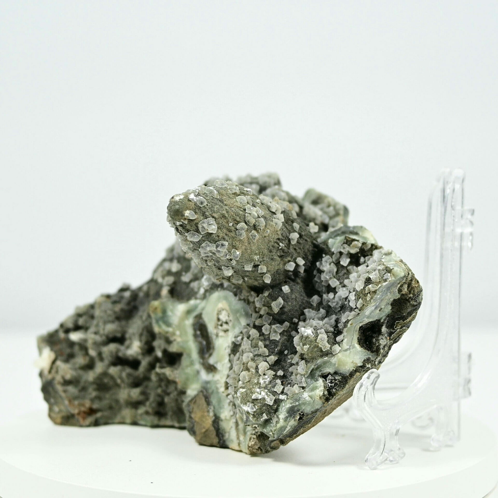Rare find dark forest with many trees and many square calcite covered inclusion side 2