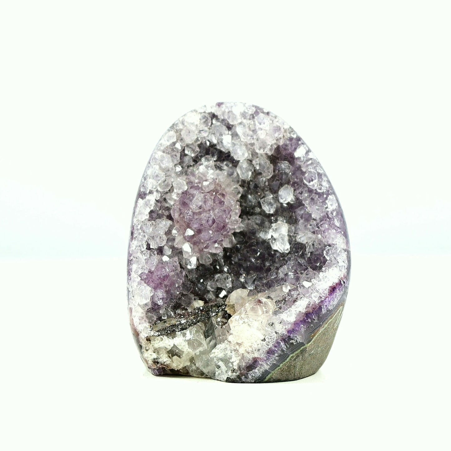 Dreamy wonderful amethyst base cluster with big and complete crystal flower front