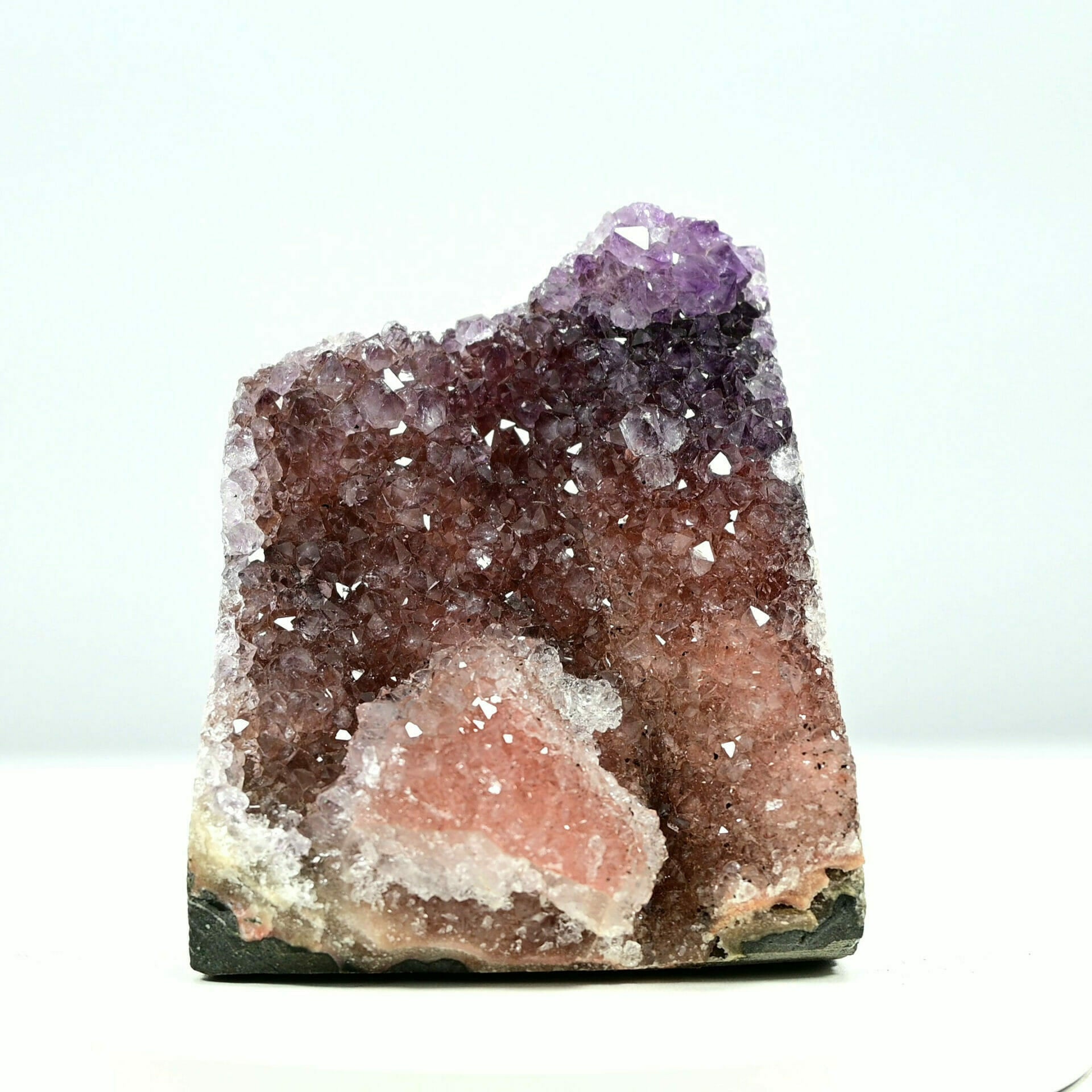 Super Colorful amethyst base cluster with pink crystal flower at bottom front