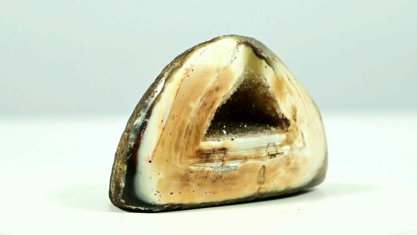 Super beautiful agate triangle geode druse with yellow crystal inside and light is able to go through side
