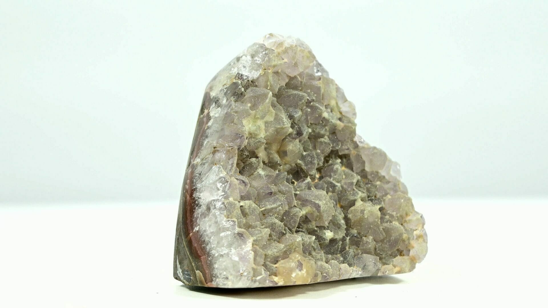 Rare type amethyst base cluster with two generational yellow durzy covered side