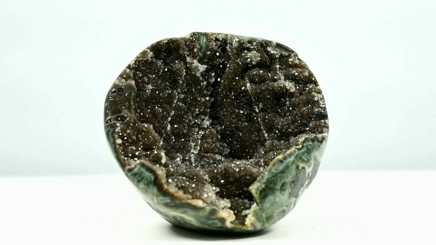 Super bling brown sugar druzy geode bowl with some belts and tiny trees inside front